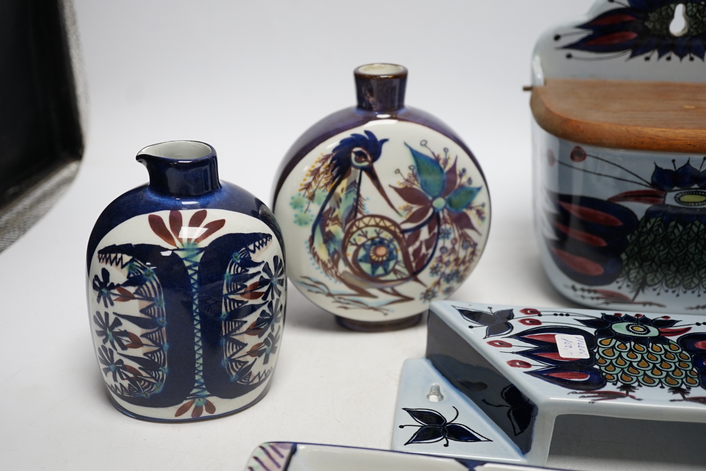 Royal Copenhagen fajance and Alumina wares; a salt pot with wooden cover and wall brisket, a small jug a moon shaped vase and a rectangular three section entrée dish, dish 29cm wide